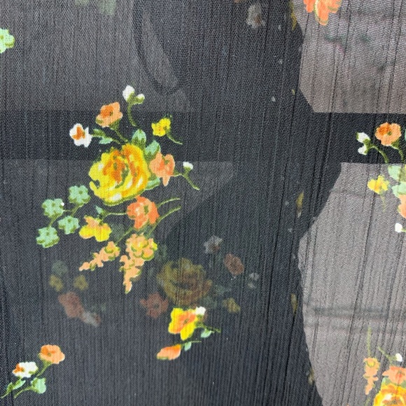 black blouse with yellow flowers